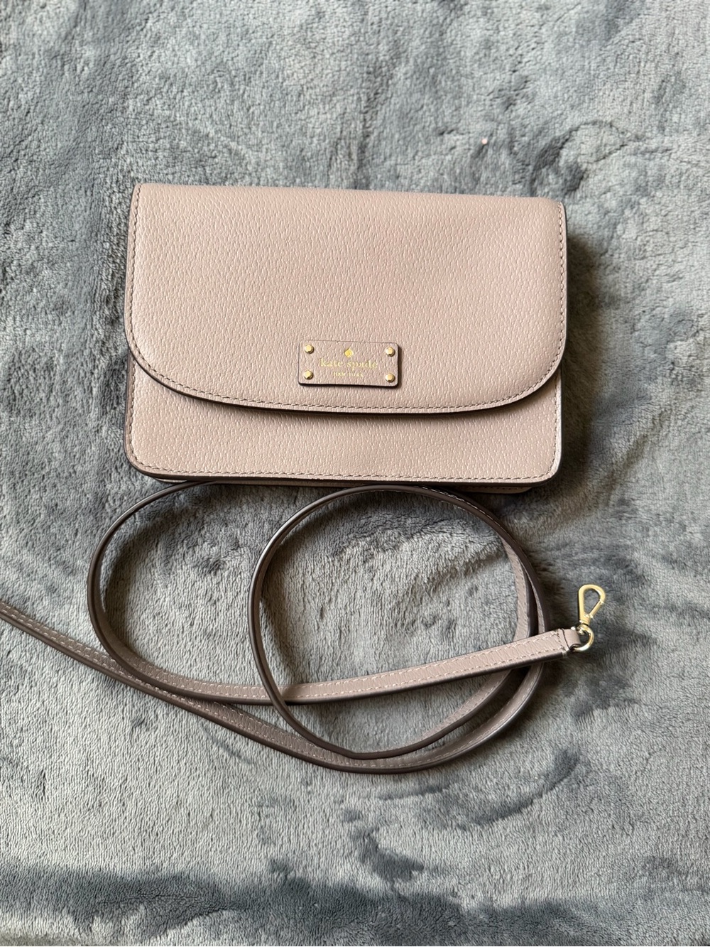 Kate Spade Leila Mini Flap Crossbody bag in warm beige leather